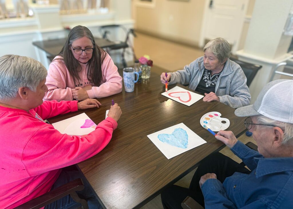Residents engage in a relaxed art session at The Princeton Senior Living.